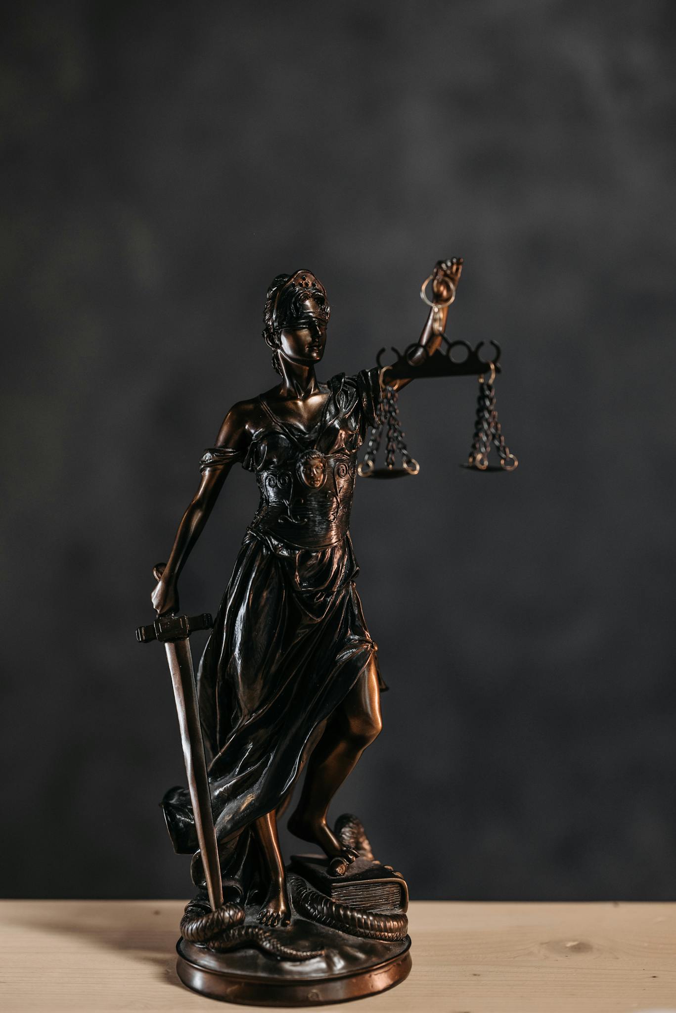 Close-up Photo of a Lady Justice Statuette